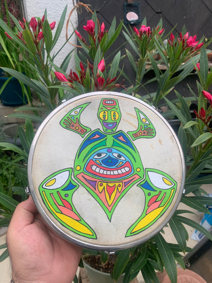 Tambourine/mini-drum made of goatskin, 22x7 centimeters in diameter, with screws for tension adjustment. Handcrafted, perfect for accompaniment, for keeping time! A catchy and hypnotic sound!