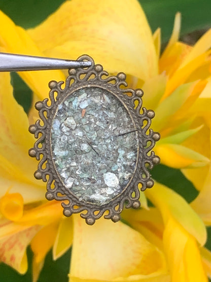Fuchsite (green micas), medal mounted by G &amp; Z, 36 mm high x30 x3. Sold with an adjustable black cord!