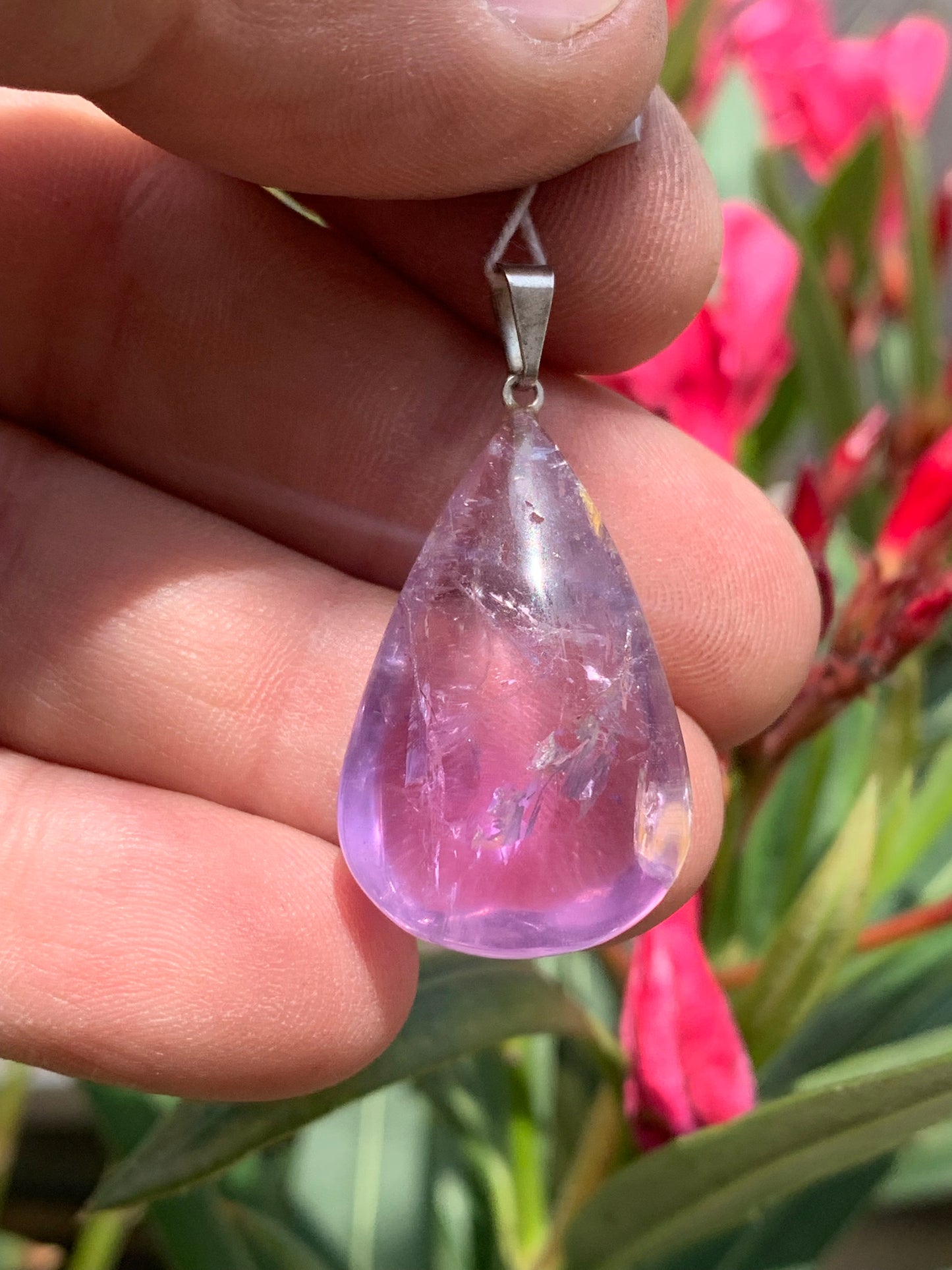 Amethyst, 'drop' pendant, 40mm high x 20mm wide x 10mm thick. Sold with a free adjustable black cord!