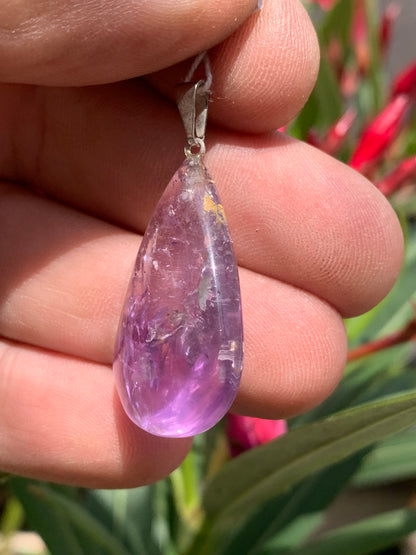 Amethyst, 'drop' pendant, 40mm high x 20mm wide x 10mm thick. Sold with a free adjustable black cord!