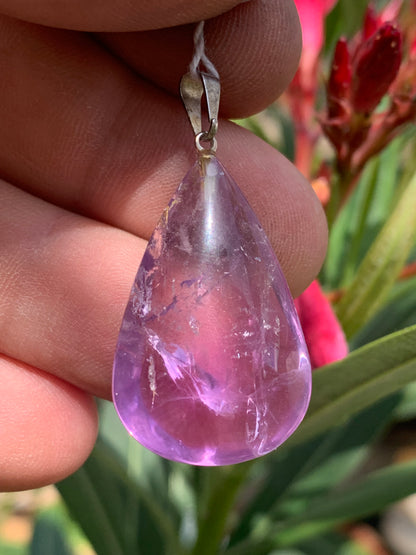 Amethyst, 'drop' pendant, 40mm high x 20mm wide x 10mm thick. Sold with a free adjustable black cord!