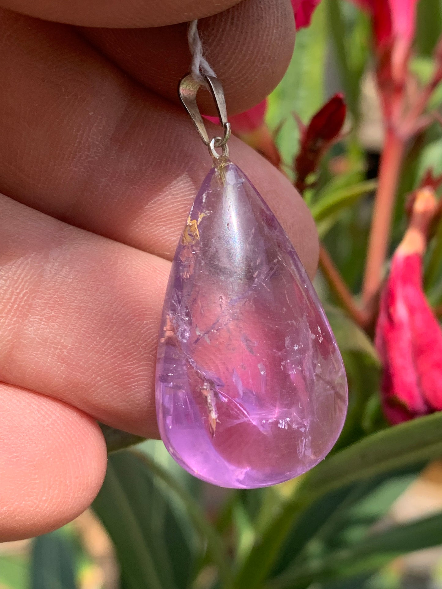 Amethyst, 'drop' pendant, 40mm high x 20mm wide x 10mm thick. Sold with a free adjustable black cord!