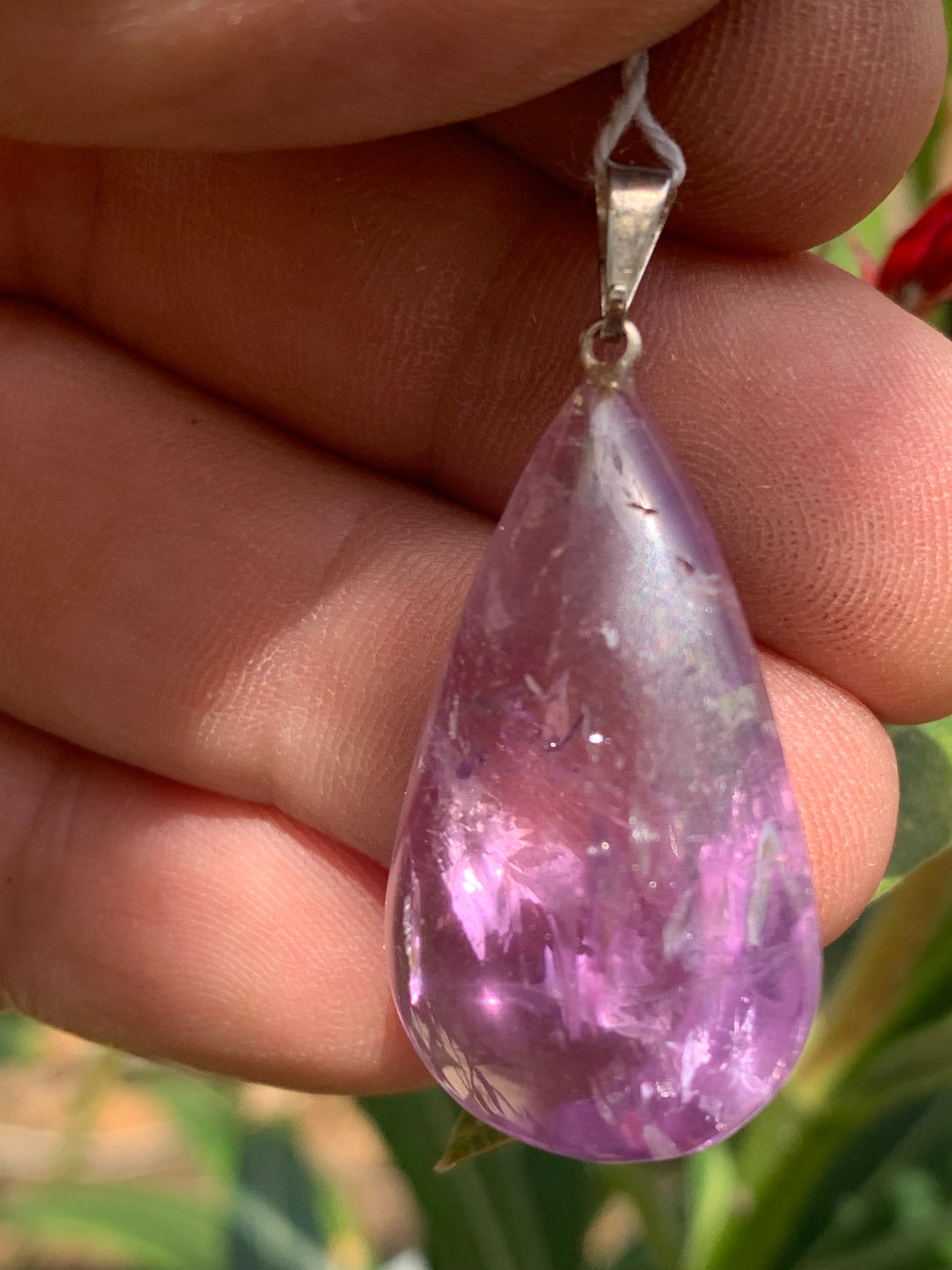 Amethyst, 'drop' pendant, 40mm high x 20mm wide x 10mm thick. Sold with a free adjustable black cord!