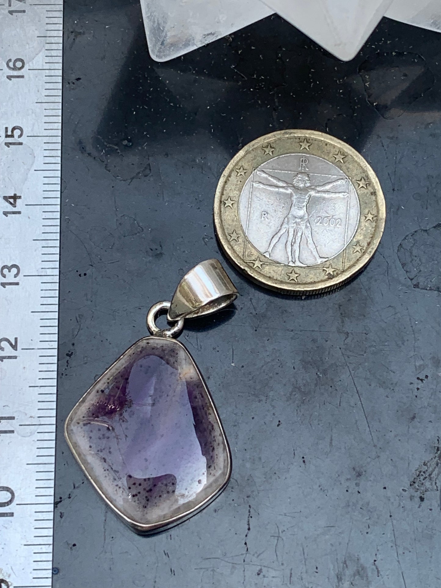 Amethyst 'super 7/ super seven', Silver pendant 37mm high x 22mm wide x 6mm thick. Sold with a free adjustable black cord!