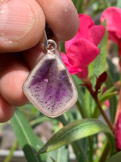 Amethyst 'super 7/ super seven', Silver pendant 37mm high x 22mm wide x 6mm thick. Sold with a free adjustable black cord!