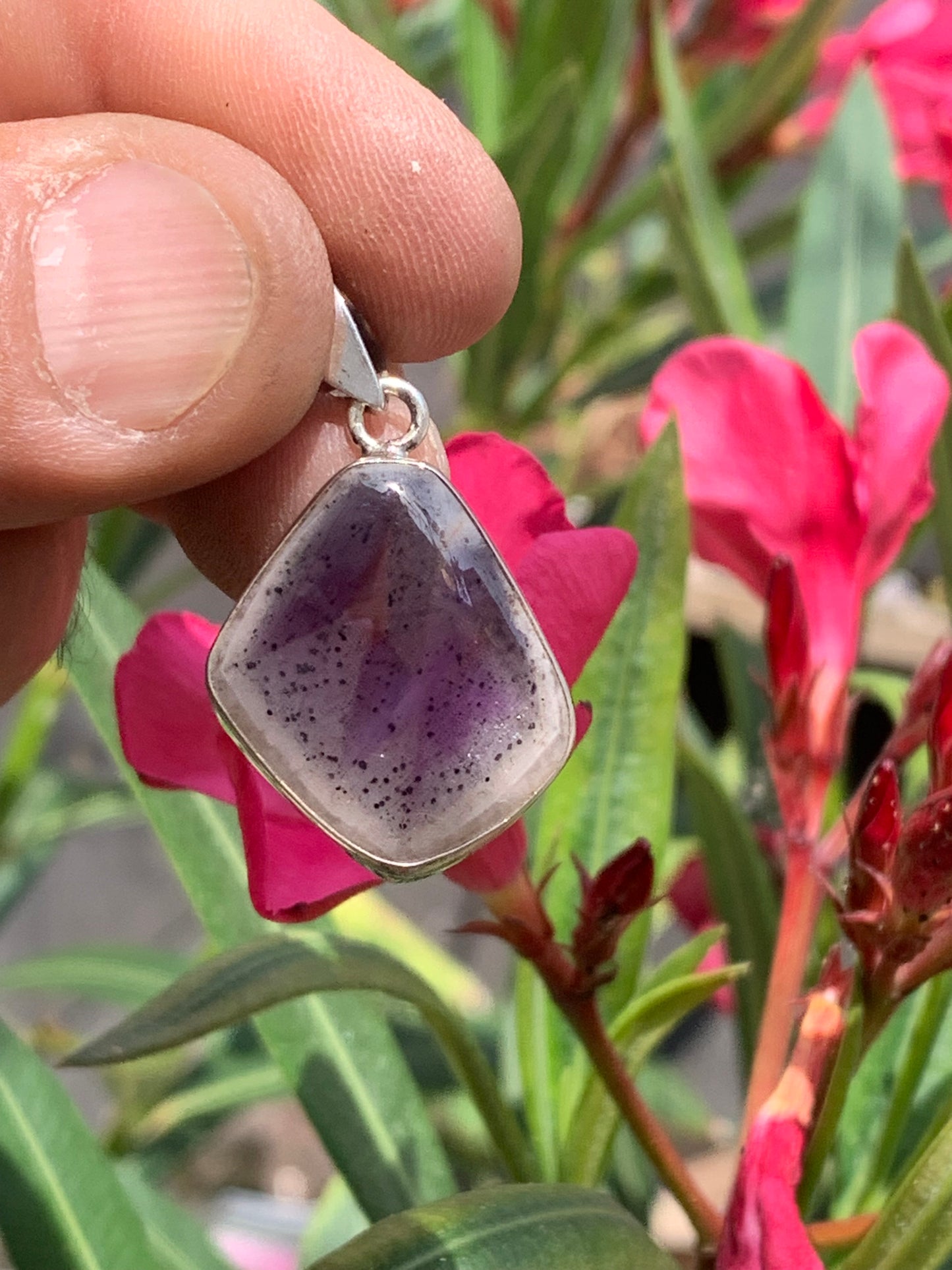 Amethyst 'super 7/ super seven', Silver pendant 37mm high x 22mm wide x 6mm thick. Sold with a free adjustable black cord!