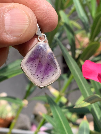 Amethyst 'super 7/ super seven', Silver pendant 37mm high x 22mm wide x 6mm thick. Sold with a free adjustable black cord!