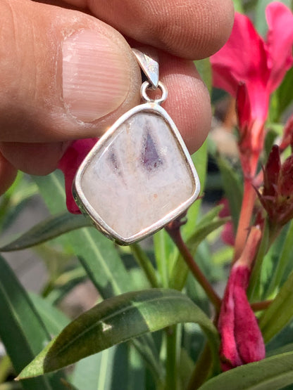 Amethyst 'super 7/ super seven', Silver pendant 37mm high x 22mm wide x 6mm thick. Sold with a free adjustable black cord!