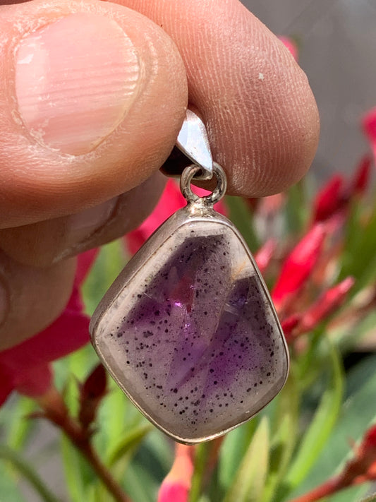 Amethyst 'super 7/ super seven', Silver pendant 37mm high x 22mm wide x 6mm thick. Sold with a free adjustable black cord!