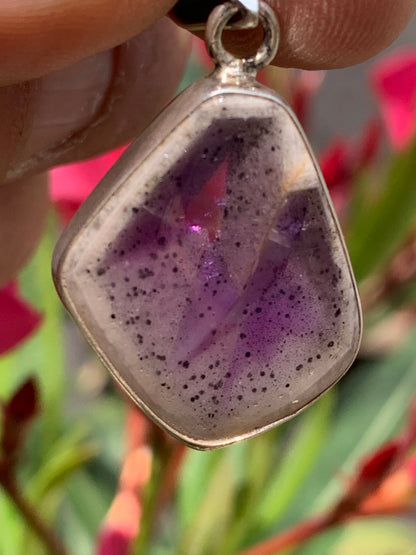 Amethyst 'super 7/ super seven', Silver pendant 37mm high x 22mm wide x 6mm thick. Sold with a free adjustable black cord!