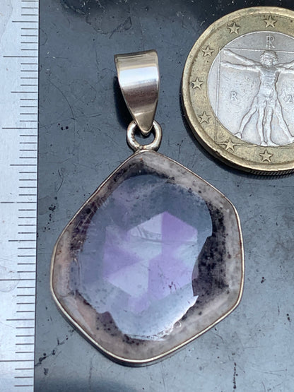 Amethyst 'super 7/ super seven', Silver pendant, 40mm high x 25mm wide x 6mm thick. Sold with a free adjustable black cord!