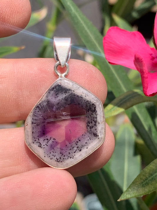 Amethyst 'super 7/ super seven', Silver pendant, 40mm high x 25mm wide x 6mm thick. Sold with a free adjustable black cord!