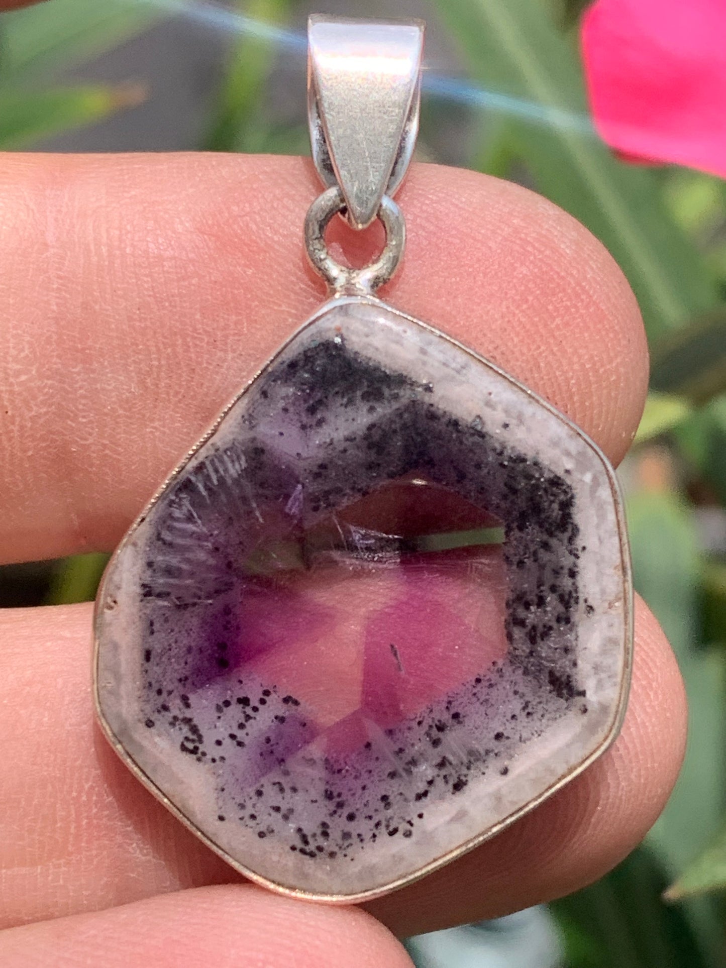 Amethyst 'super 7/ super seven', Silver pendant, 40mm high x 25mm wide x 6mm thick. Sold with a free adjustable black cord!