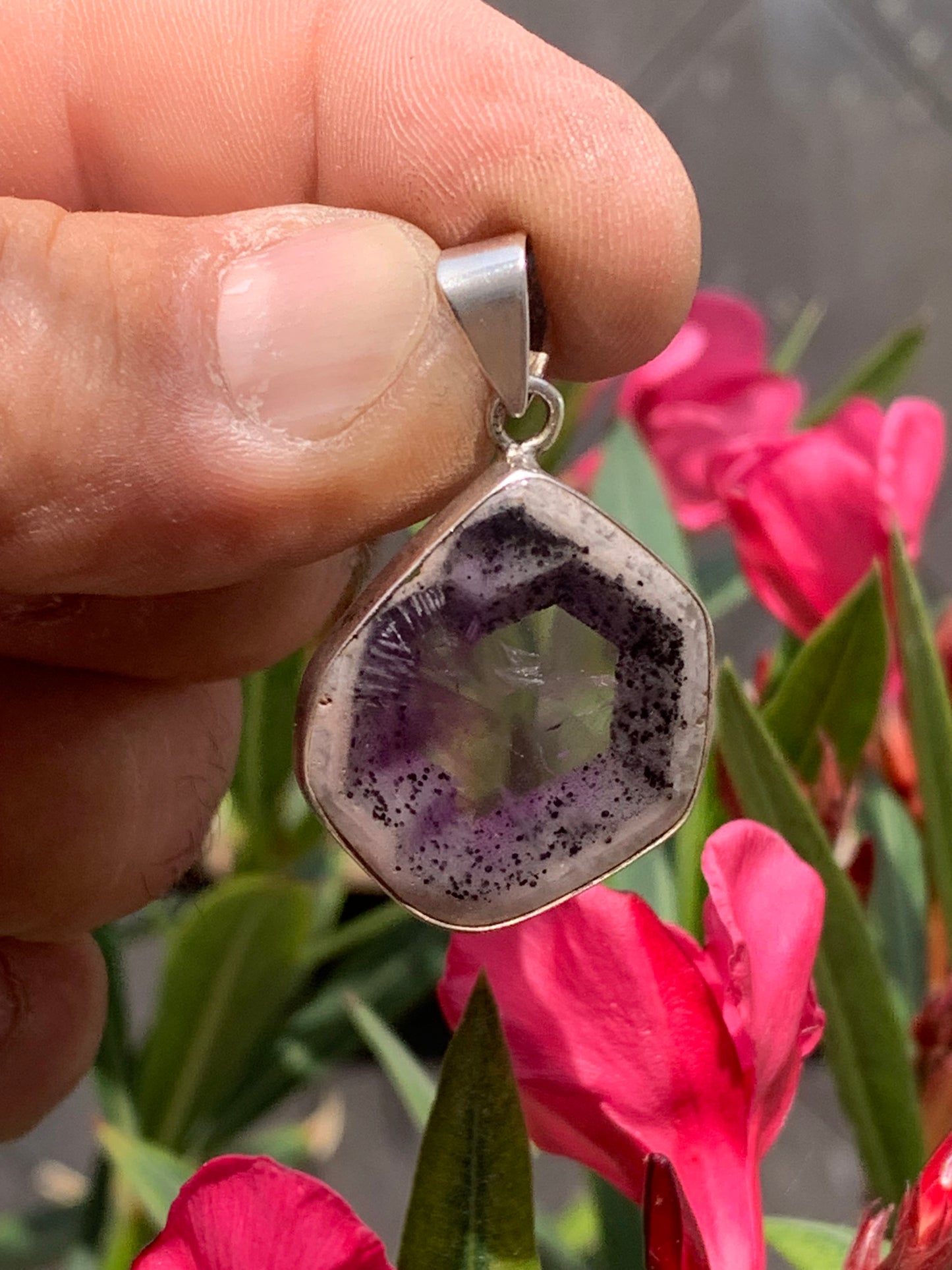 Amethyst 'super 7/ super seven', Silver pendant, 40mm high x 25mm wide x 6mm thick. Sold with a free adjustable black cord!