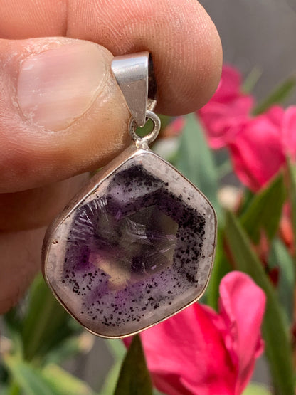 Amethyst 'super 7/ super seven', Silver pendant, 40mm high x 25mm wide x 6mm thick. Sold with a free adjustable black cord!