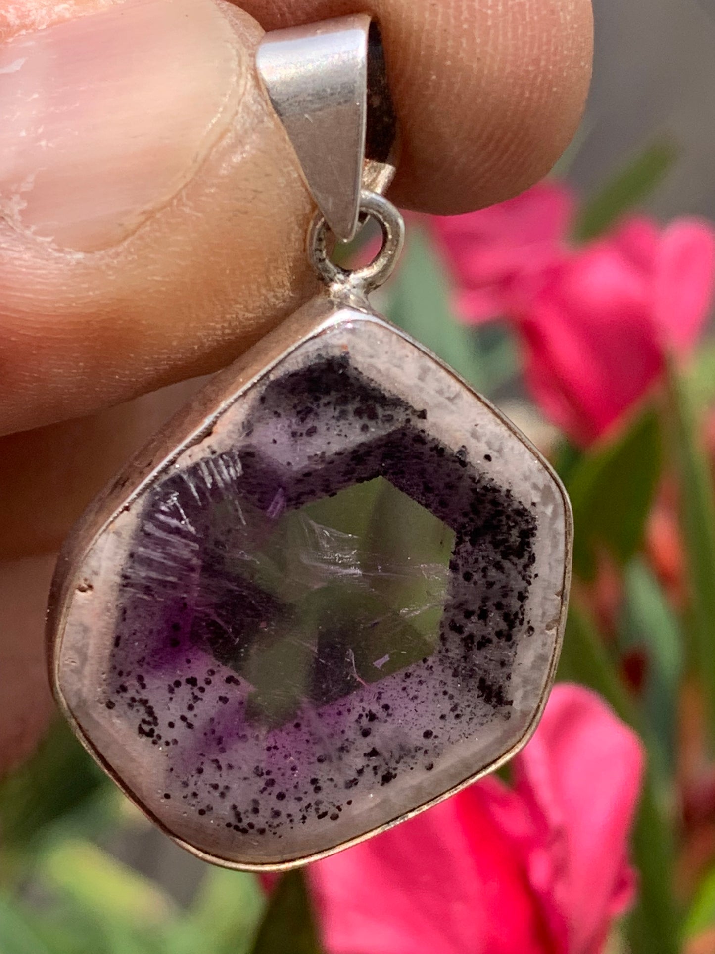 Amethyst 'super 7/ super seven', Silver pendant, 40mm high x 25mm wide x 6mm thick. Sold with a free adjustable black cord!