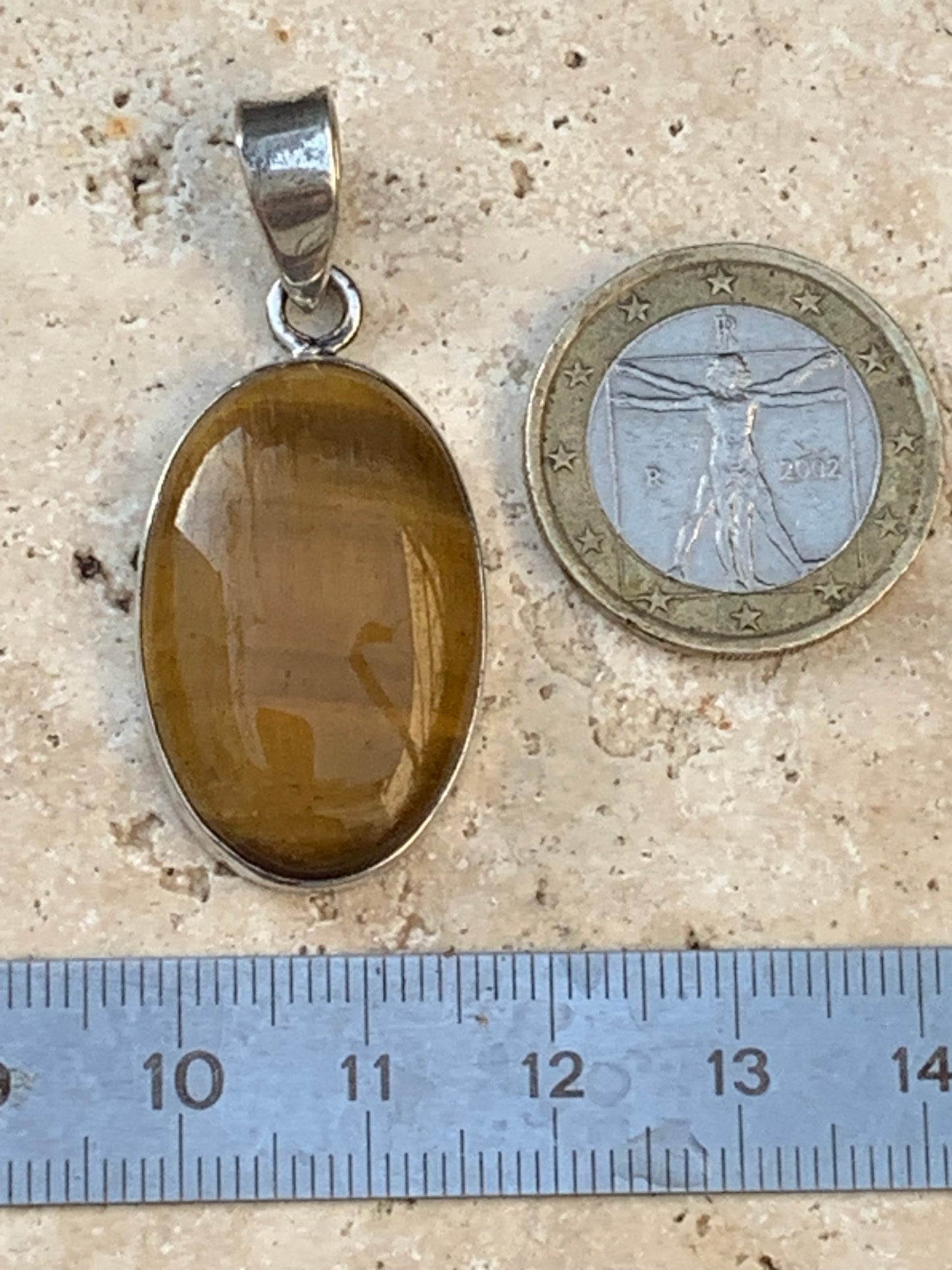 Oeil de tigre, pendentif en Argent de 44mm de hauteur x 20 de largeur x 8 d'épaisseur. Vendu avec cordon réglable !