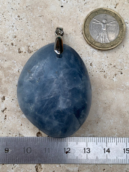 Blue calcite, pendant measuring 47mm high x 37mm wide x 18mm deep. Sold with an adjustable black cord!