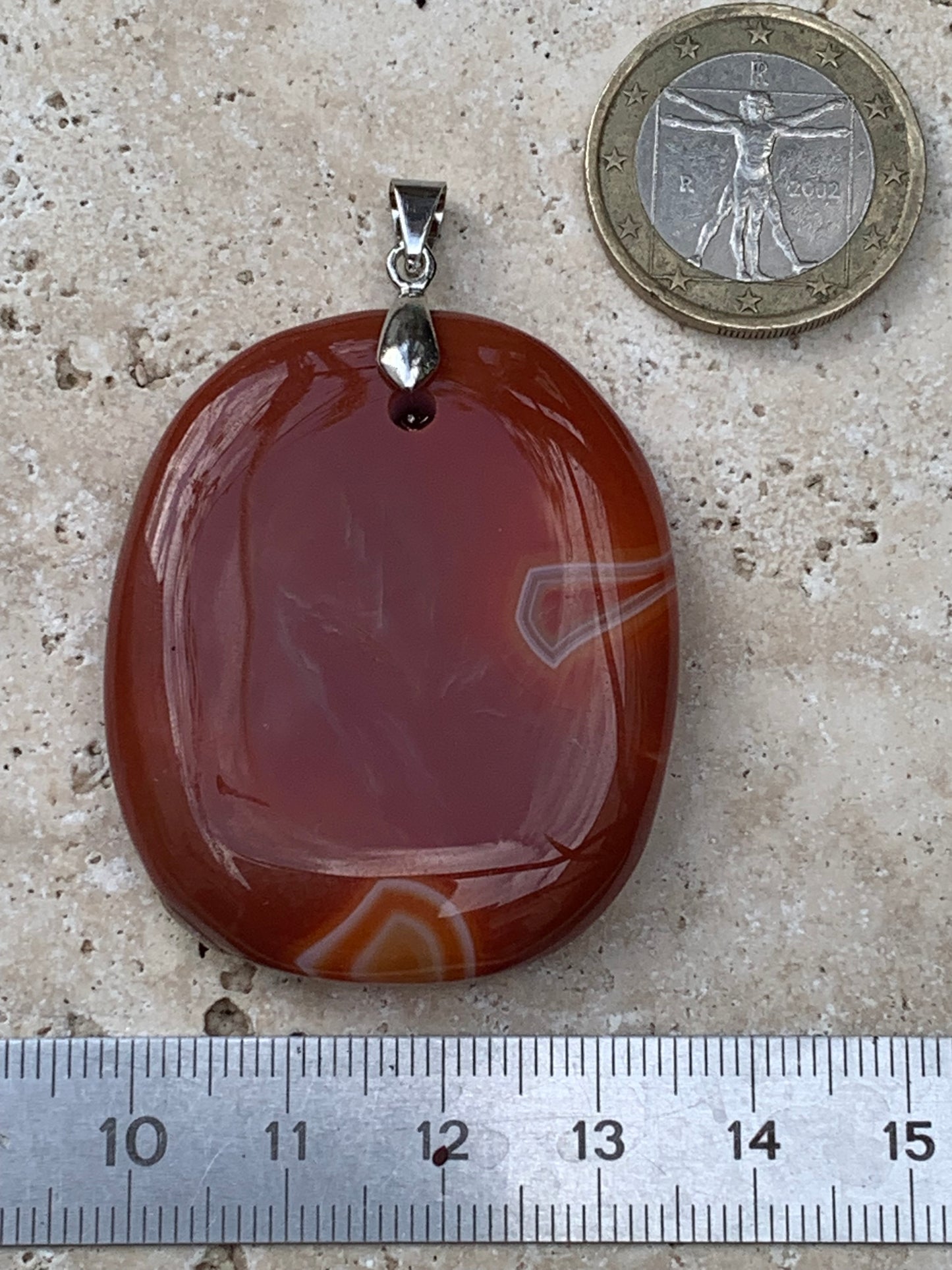 Carnelian, pendant measuring 55mm high x 38mm wide x 9mm thick. Sold with an adjustable black cord!