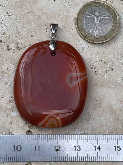 Carnelian, pendant measuring 55mm high x 38mm wide x 9mm thick. Sold with an adjustable black cord!
