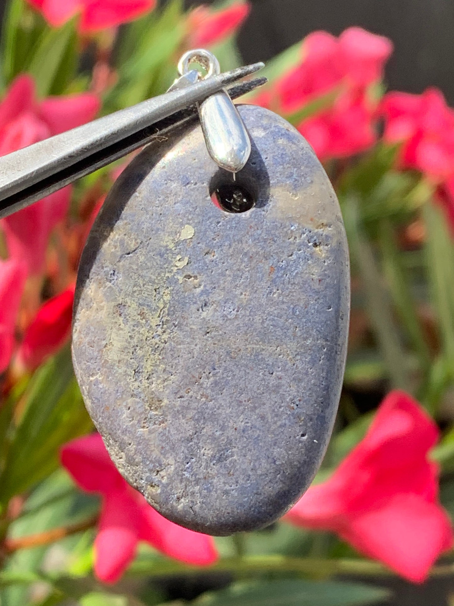 Dumortierite, pendant measuring 45mm high x30 x10. Sold with an adjustable black cord!