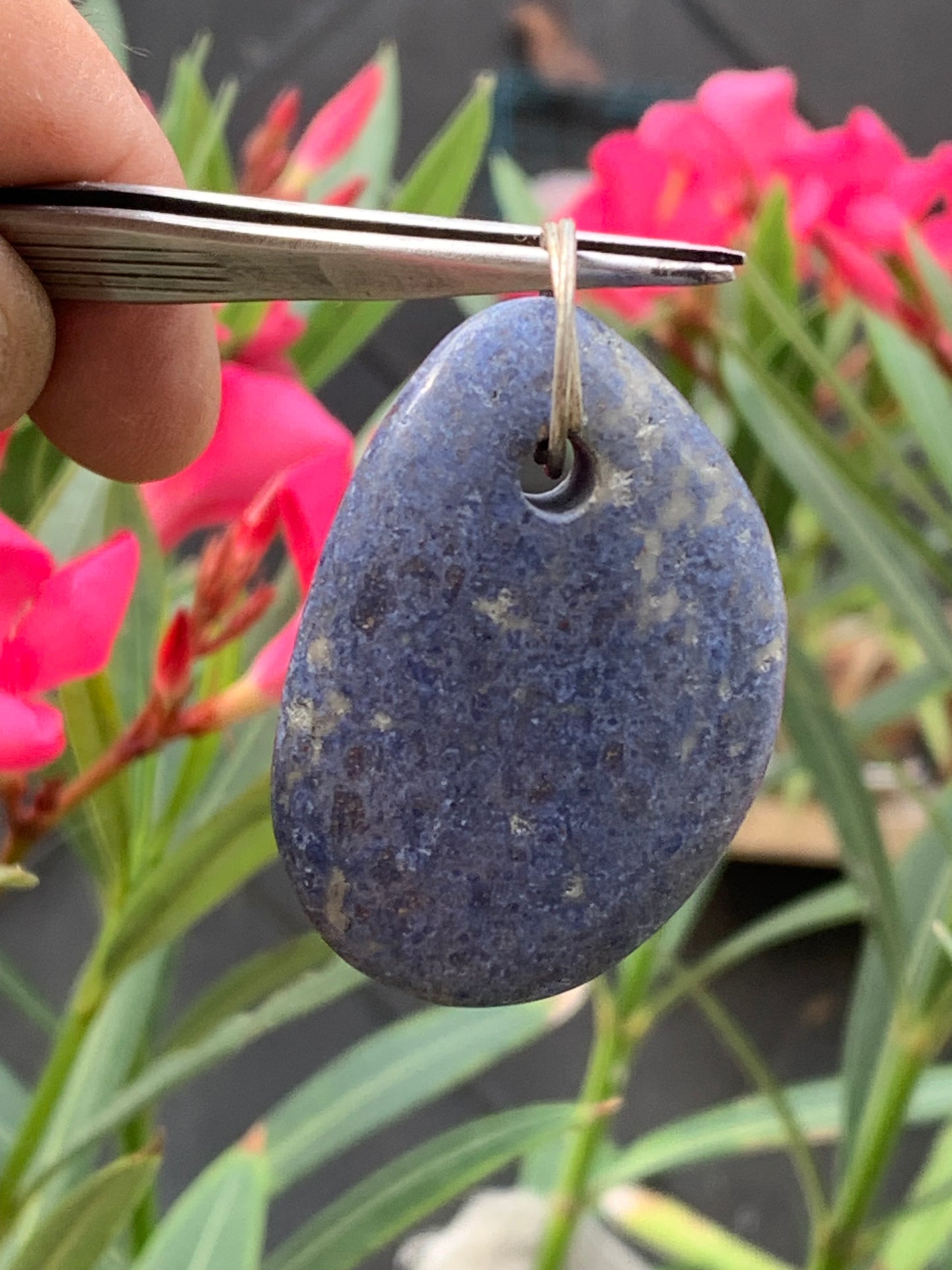 Dumortierite, pendant measuring 47mm high x 32mm wide x 12mm deep. Sold with an adjustable black cord!