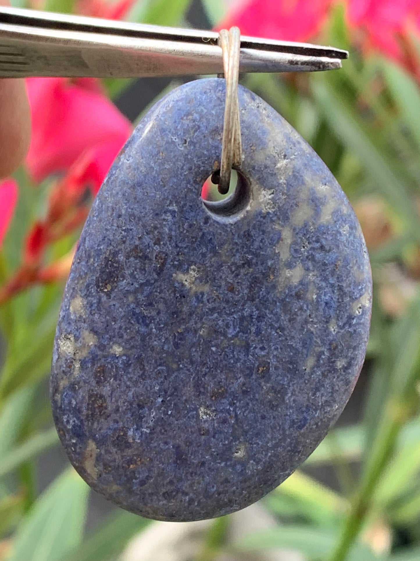 Dumortierite, pendant measuring 47mm high x 32mm wide x 12mm deep. Sold with an adjustable black cord!