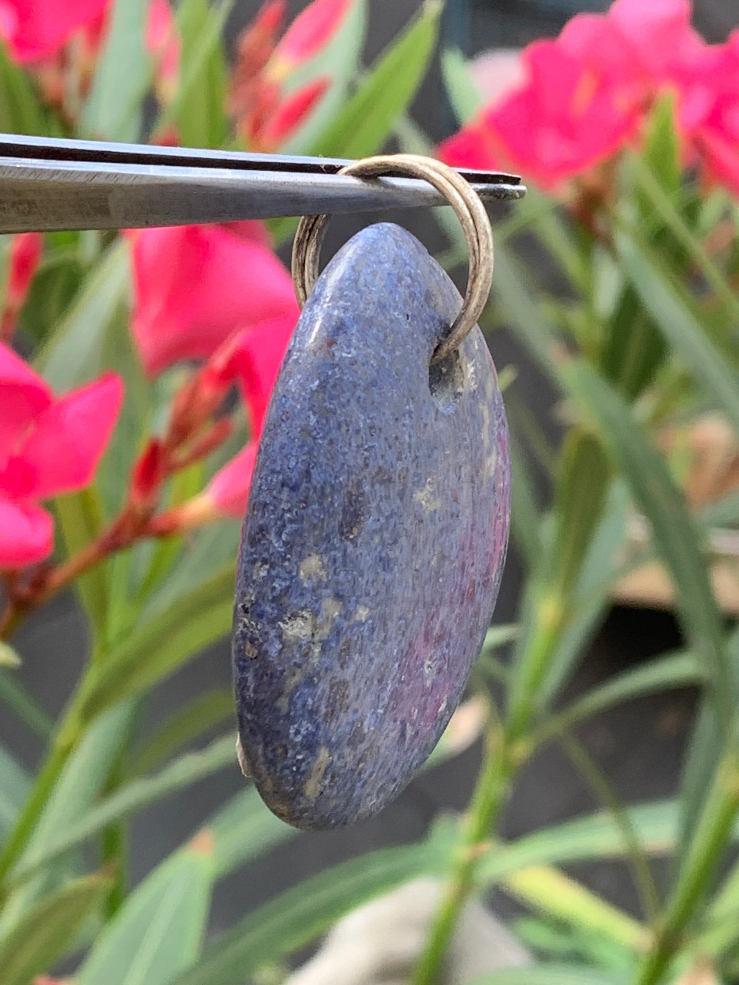 Dumortierite, pendant measuring 47mm high x 32mm wide x 12mm deep. Sold with an adjustable black cord!