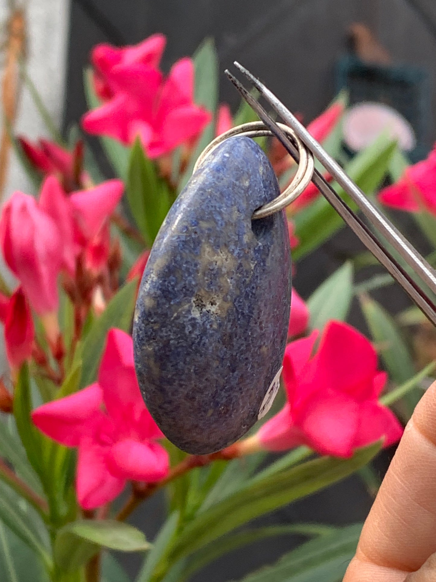 Dumortierite, pendant measuring 47mm high x 32mm wide x 12mm deep. Sold with an adjustable black cord!