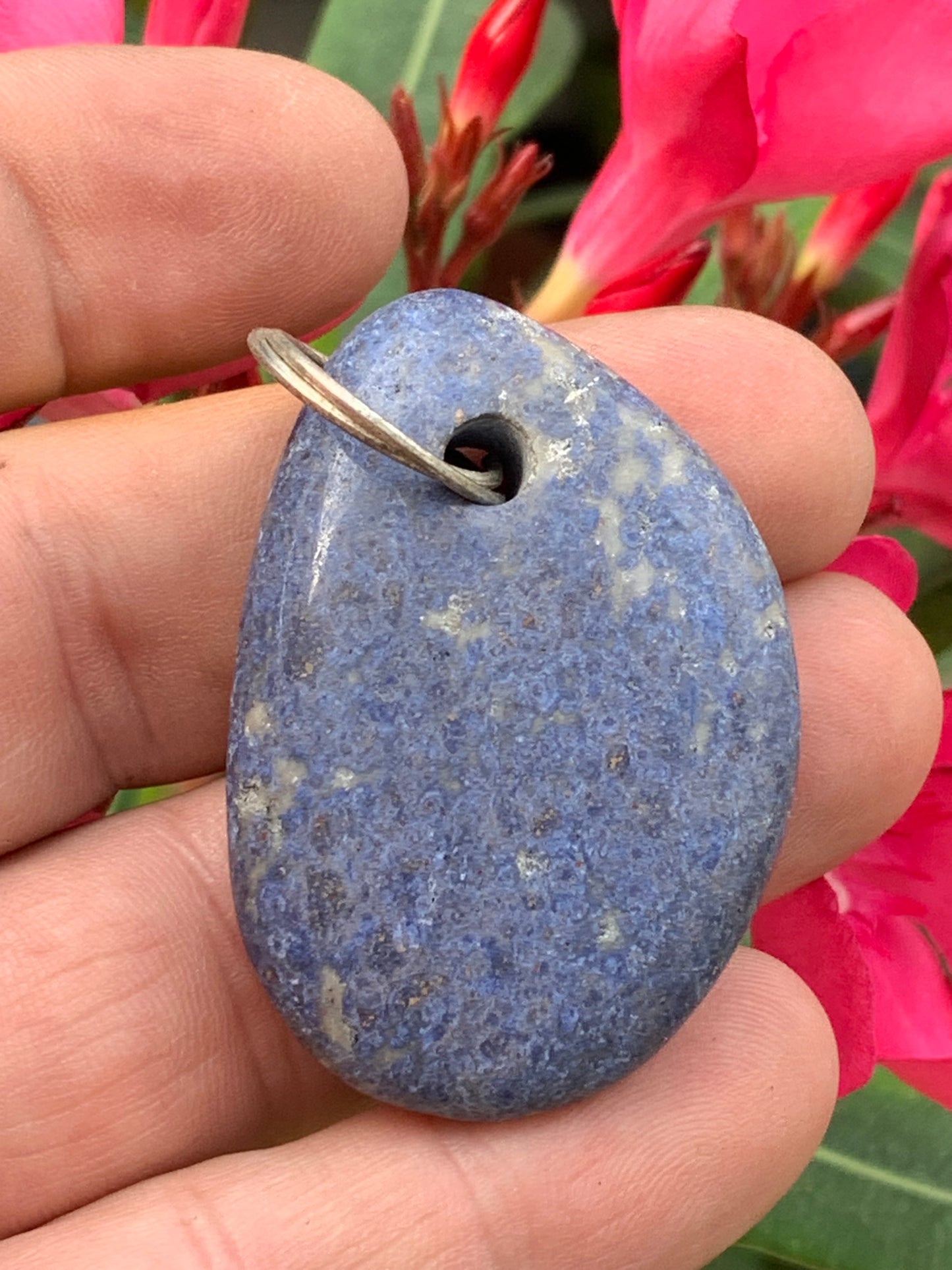 Dumortierite, pendant measuring 47mm high x 32mm wide x 12mm deep. Sold with an adjustable black cord!