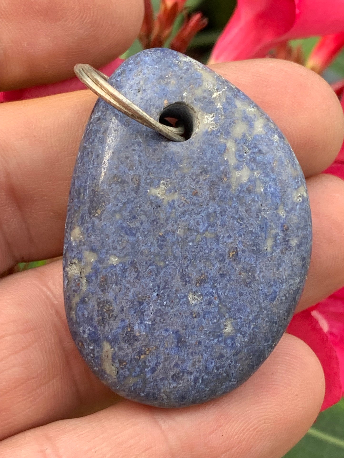 Dumortierite, pendant measuring 47mm high x 32mm wide x 12mm deep. Sold with an adjustable black cord!