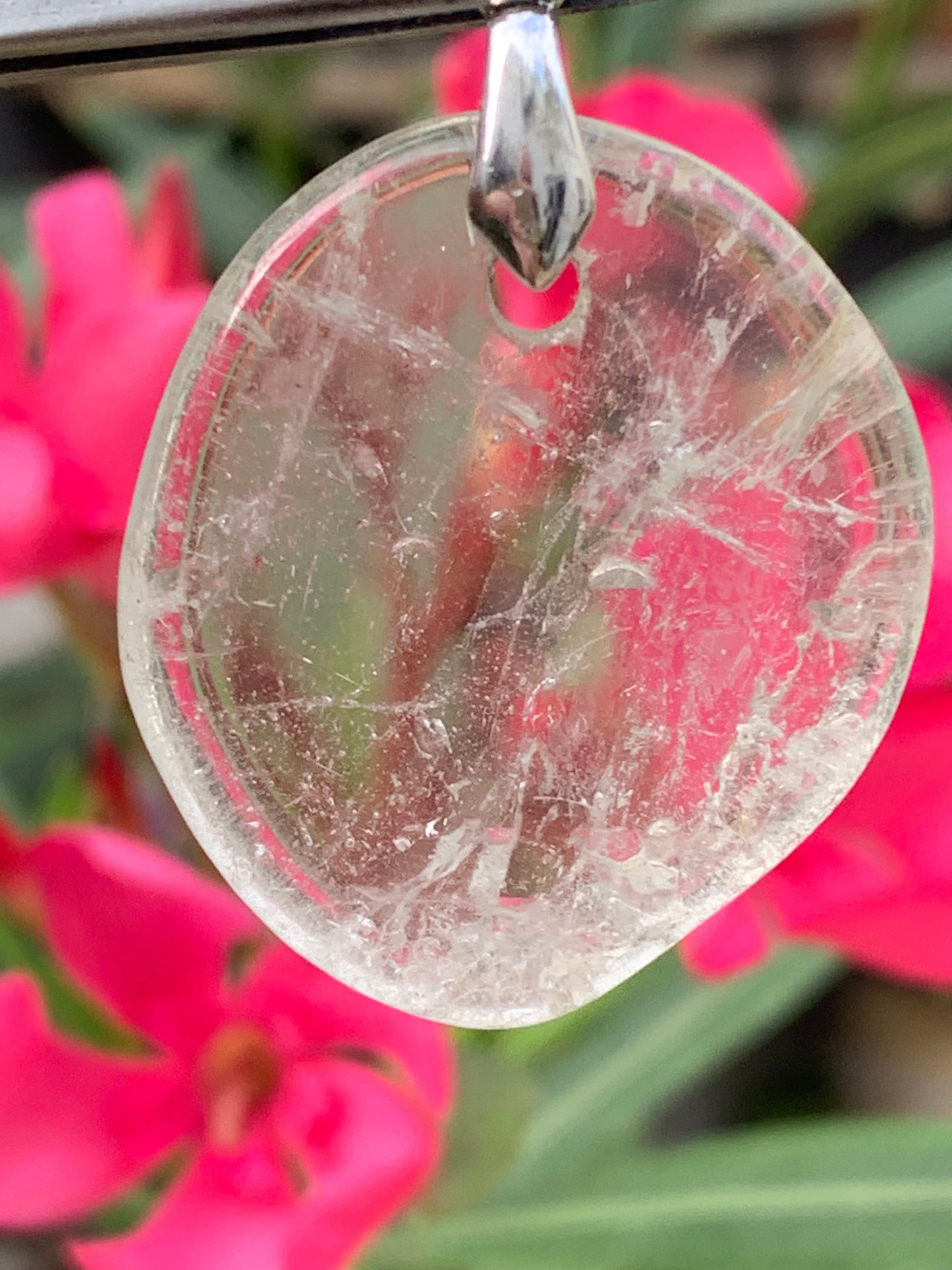 Rock crystal/Quartz, pendant measuring 45mm high x 30mm wide x 7mm thick. Sold with an adjustable black cord!