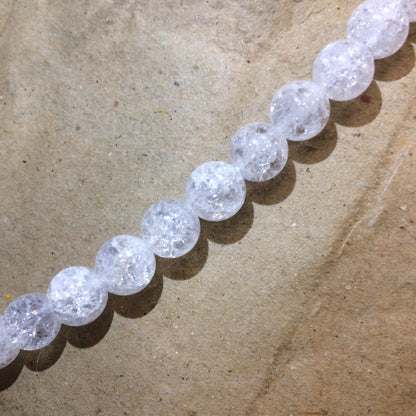Cristal de roche 'Craquelé' ou 'Neige' (Quartz), perles rondes de 4, 6, 8, 10, 12, 14 mm. Vendu en fil de perle 38/39 cm, en bracelet de 17 à 21 cm, en collier de 45 ou sautoir de 60 cm !