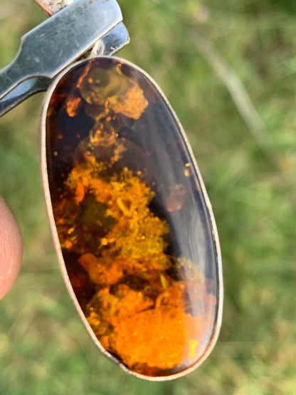 Amber, silver pendant measuring 52 x 18 x 6 mm / 6.3 grams, sold with a sliding black cord measuring 40 to 70 cm!