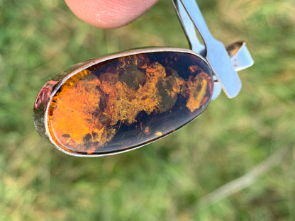 Amber, silver pendant measuring 52 x 18 x 6 mm / 6.3 grams, sold with a sliding black cord measuring 40 to 70 cm!