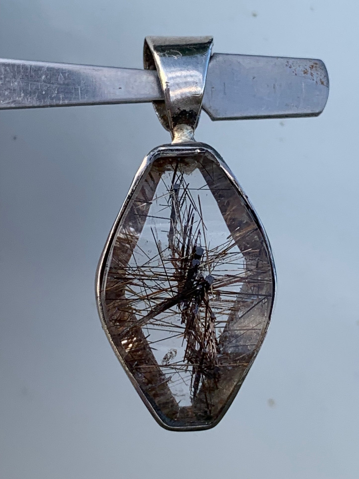 Rock crystal (quartz), with tourmaline inclusions! Silver pendant, 38 mm high x 16 x 8 - 8.3 grams. Sold with an adjustable black cord!