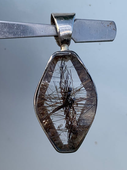 Rock crystal (quartz), with tourmaline inclusions! Silver pendant, 38 mm high x 16 x 8 - 8.3 grams. Sold with an adjustable black cord!