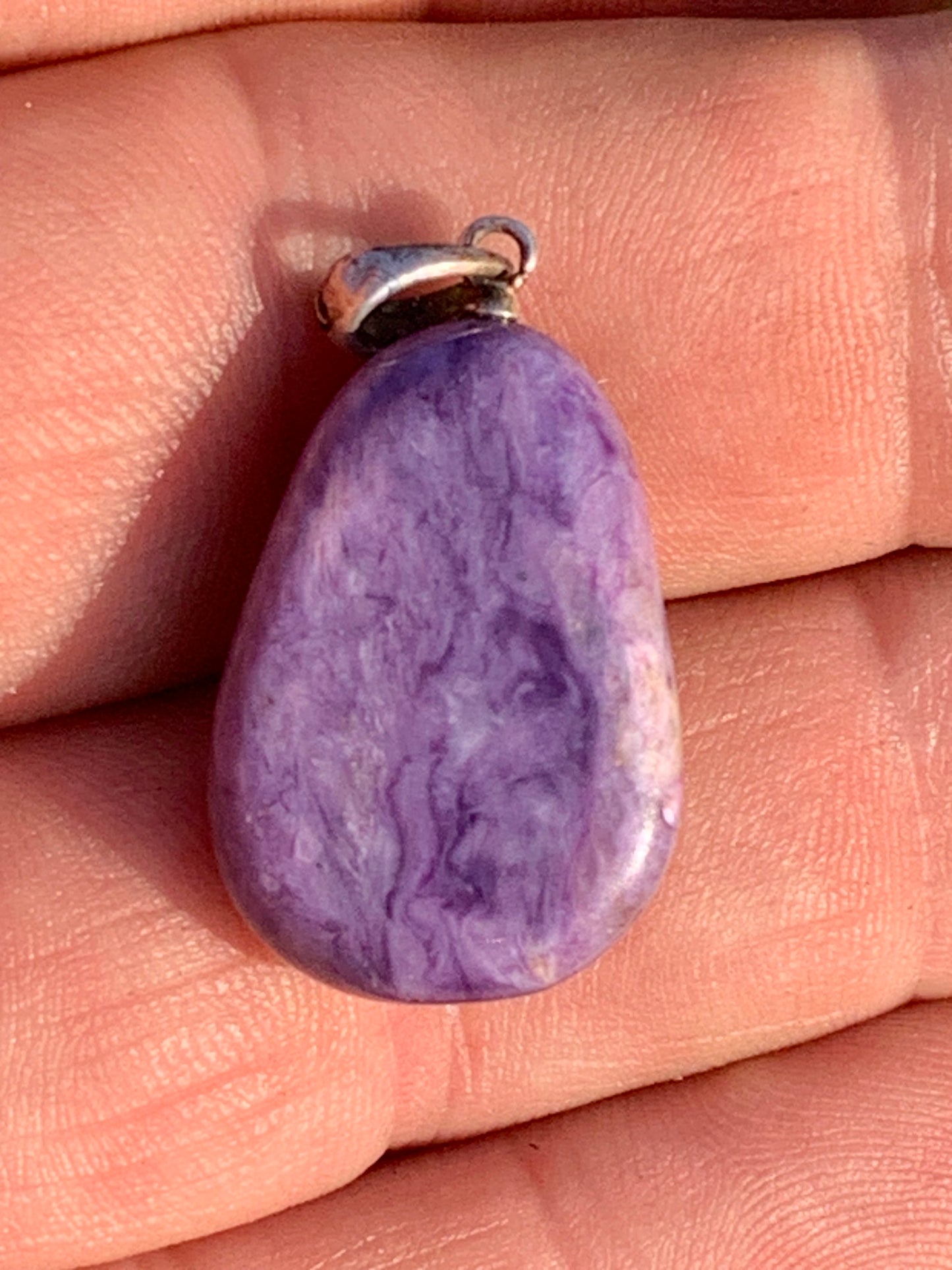 Charoite, pendant with silver clasp, 30mm x 16 x 10. Sold with adjustable black cord!