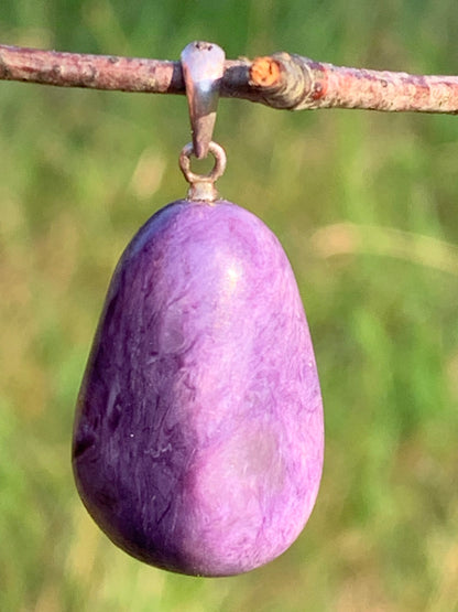 Charoite, pendant with silver clasp, 30mm x 16 x 10. Sold with adjustable black cord!