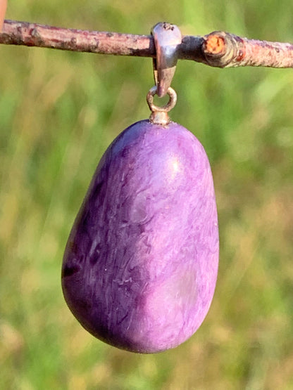 Charoite, pendant with silver clasp, 30mm x 16 x 10. Sold with adjustable black cord!