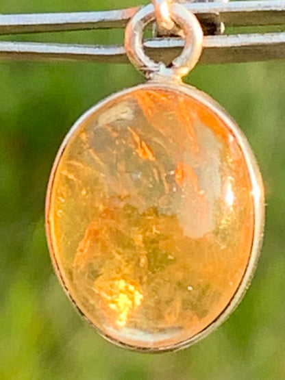 Citrine, silver medallion 30mm high x 14 x 8. Sold with adjustable cord, ready to wear!