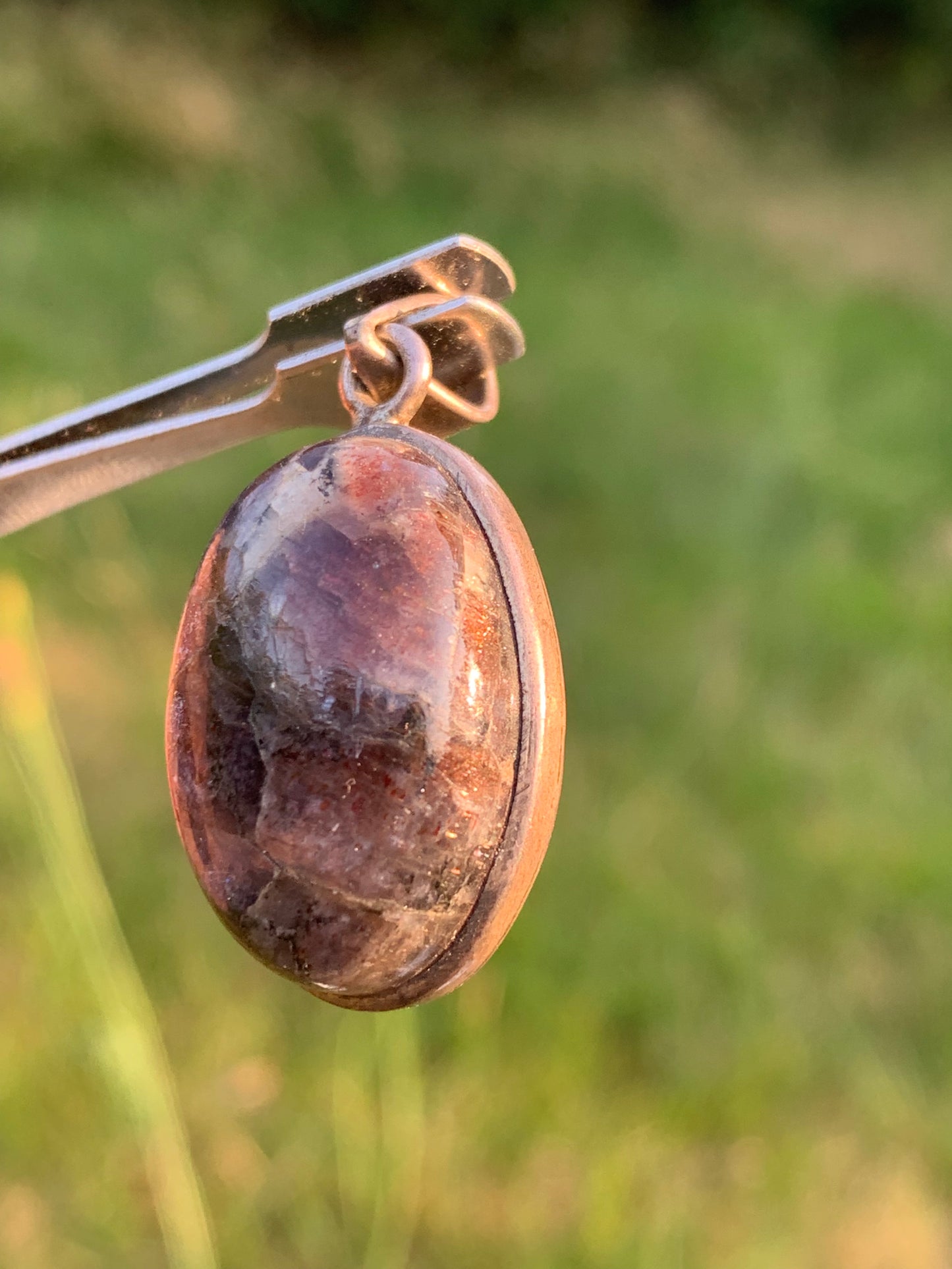 Cacoxenite Amethyst, 38mm x 19 x 10 Silver pendant. Sold with a free adjustable black cord!