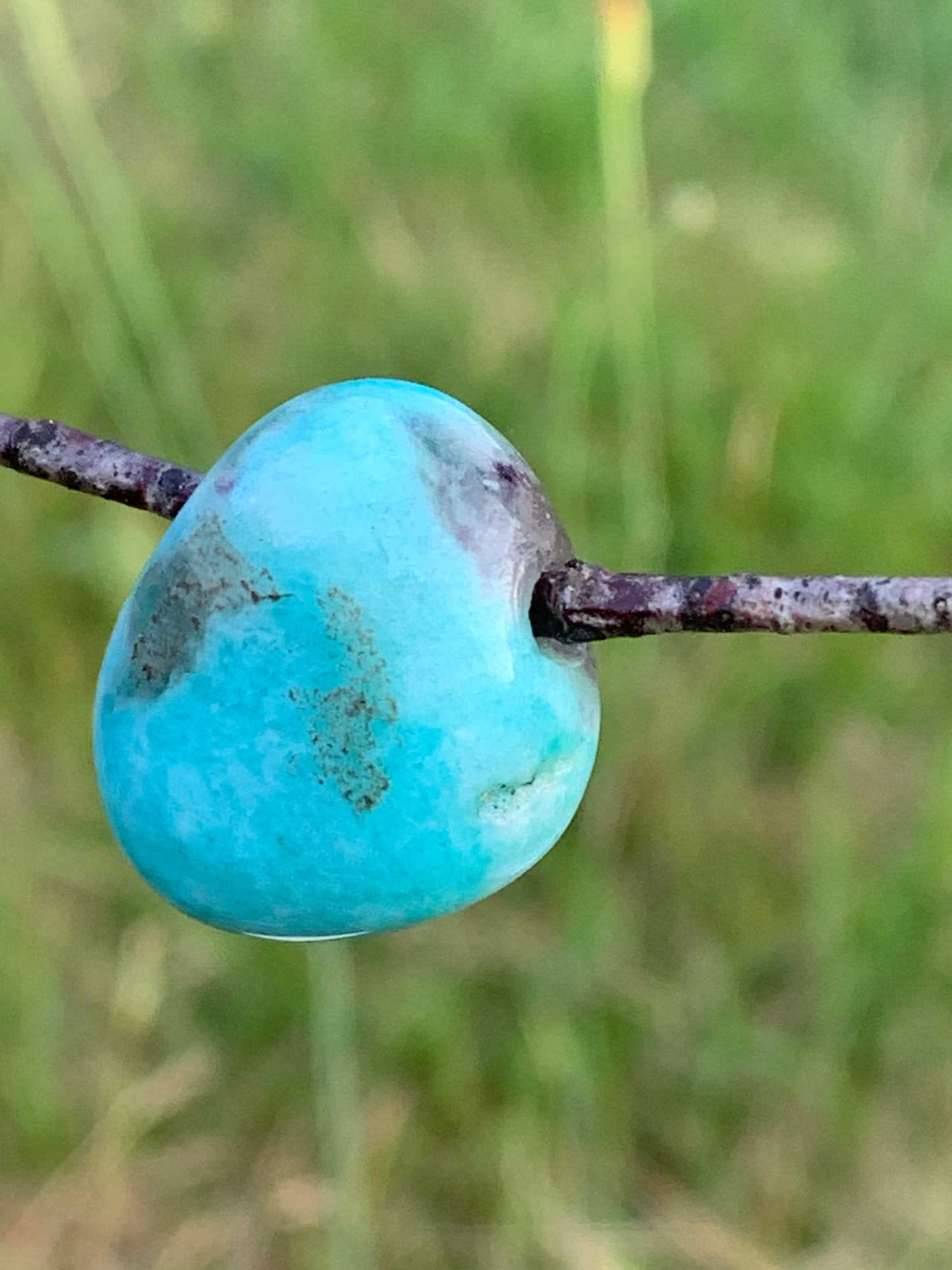 Amazonite, drilled stone 24mm high x 20 x 11. Sold with free adjustable black cord!