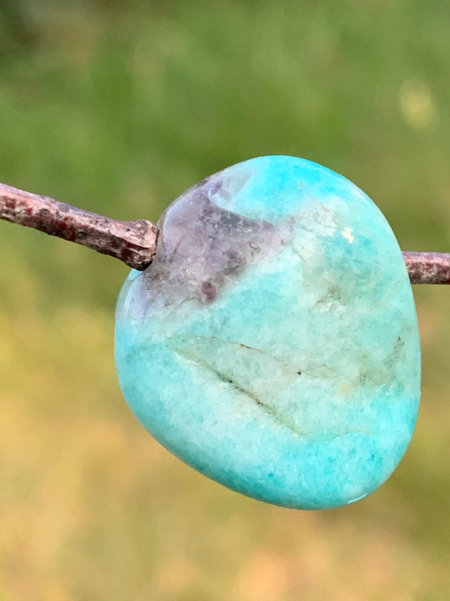 Amazonite, drilled stone 24mm high x 20 x 11. Sold with free adjustable black cord!