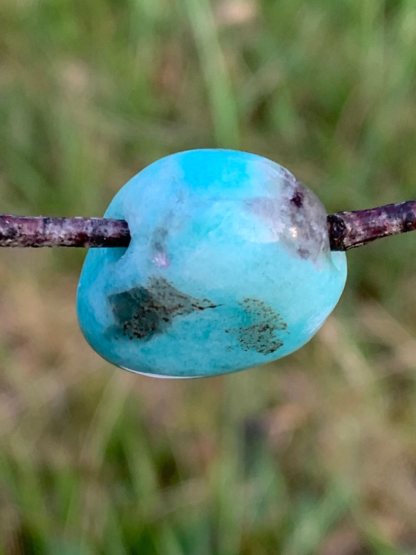 Amazonite, drilled stone 24mm high x 20 x 11. Sold with free adjustable black cord!