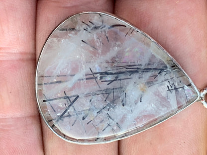 Rock crystal/quartz with black tourmaline inclusions! Silver pendant, 48mm high x30 x7. Sold with adjustable black cord!