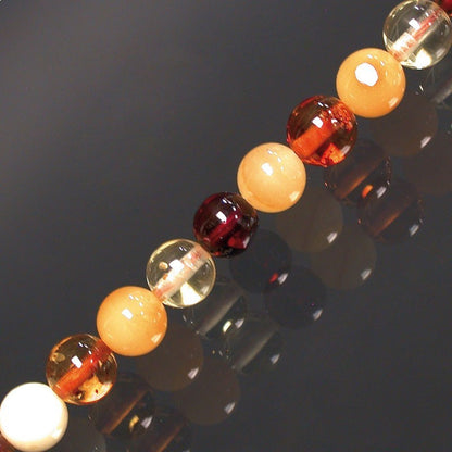 Amber, round beads of 5/6 or 7 millimeters, sold in bracelets of 17 to 21 centimeters or in necklaces of 45 centimeters. Quality AA to AAA, superb beads, light and incredibly soft!