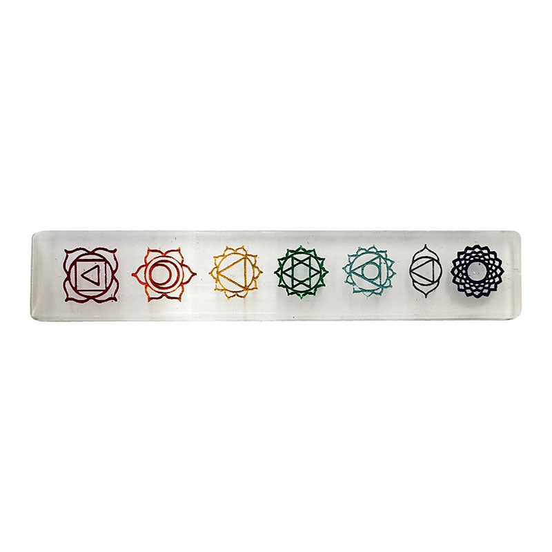 Rectangular selenite plate with a 7 chakra motif. Perfect for purifying and charging minerals, jewelry, etc.