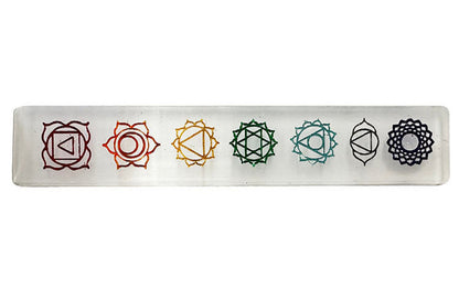 Rectangular selenite plate with a 7 chakra motif. Perfect for purifying and charging minerals, jewelry, etc.