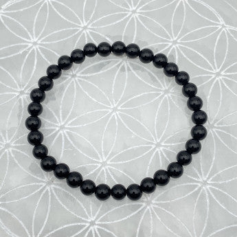 Onyx 'finition Mat', perles rondes de 6 ou 8 mm. Vendu en fil de perle 38/39 cm, en bracelet de 17 à 21cm, en collier de 45 ou sautoir de 60cm. Qualité AA à AAA, superbes perles à l'effet calmant !